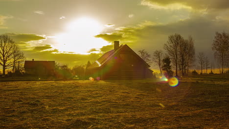 Time-lapse-shot-of-country-homes-under-a-cloud-covered-sky