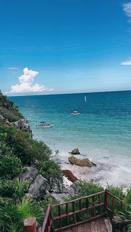 tropical beach scene with boats