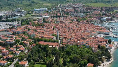 aerial: coastal izola town on adriatic mediterranean coast in slovenia, 4k view