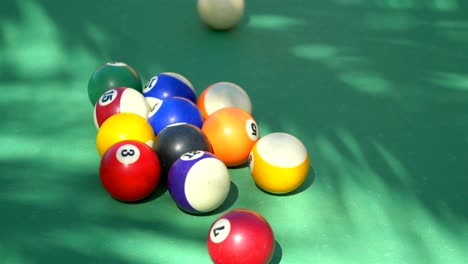 video of hitting billiards balls on the table in 4k