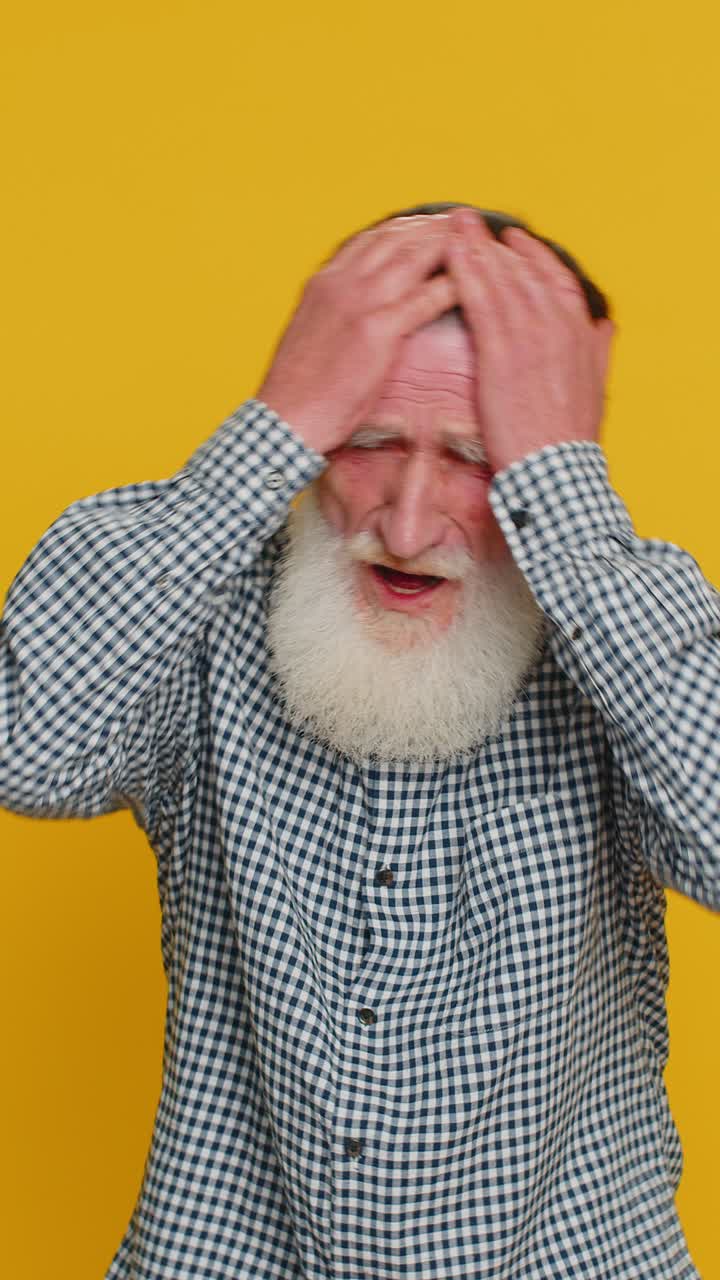Irritated angry senior old man screams from stress tension problems shock rage nervous quarrel