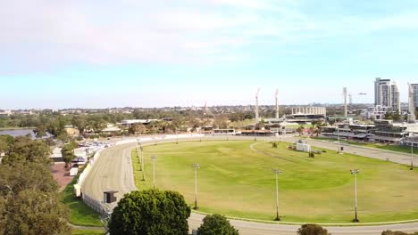 aerial view of race track and cityscape near swan river