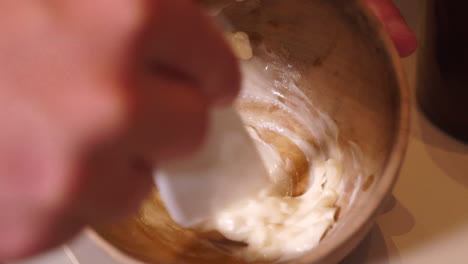 Professional-preparing-a-mixture-of-hair-products