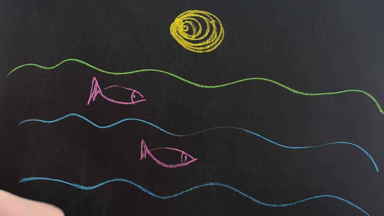 海の魚たち。黒板にチョークで描きます。