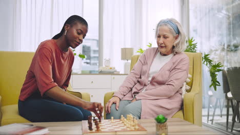 Senior-woman,-caregiver-and-game-of-chess