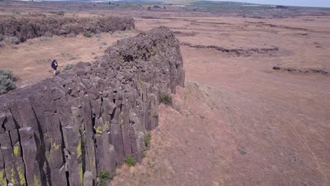 Hiker-explores-rugged-terrain-of-rock-columns-in-central-Washington