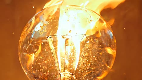 a light bulb with a fire inside of it