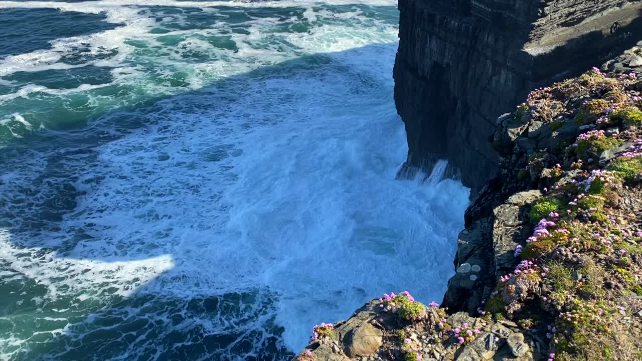 Waves Crashing on Dramatic Cliffs