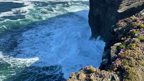 waves crashing on dramatic cliffs