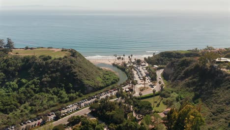 Aerial-view-of-Arroyo-Burro-beach-and-parking-lot,-in-Santa-Barbra,-California