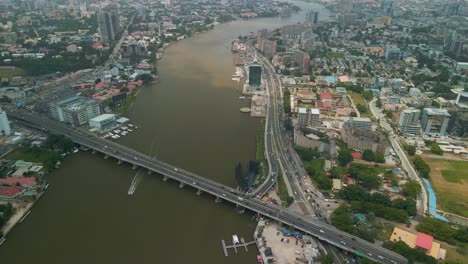 traffic and cityscape of victoria island, lagos, nigeria featuring falomo bridge, lagos law school and the civic centre tower