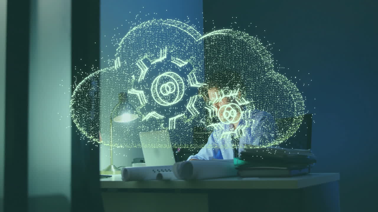 Cloud computing and data processing animation over person working at desk