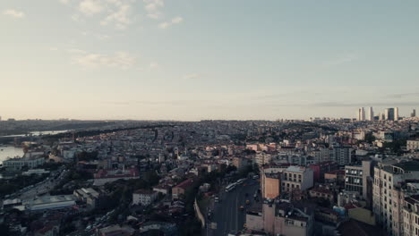 Drone-view-of-dense-residential-buildings-and-roads-in-the-city-of-Istanbul-near-the-pier,-Türkiye