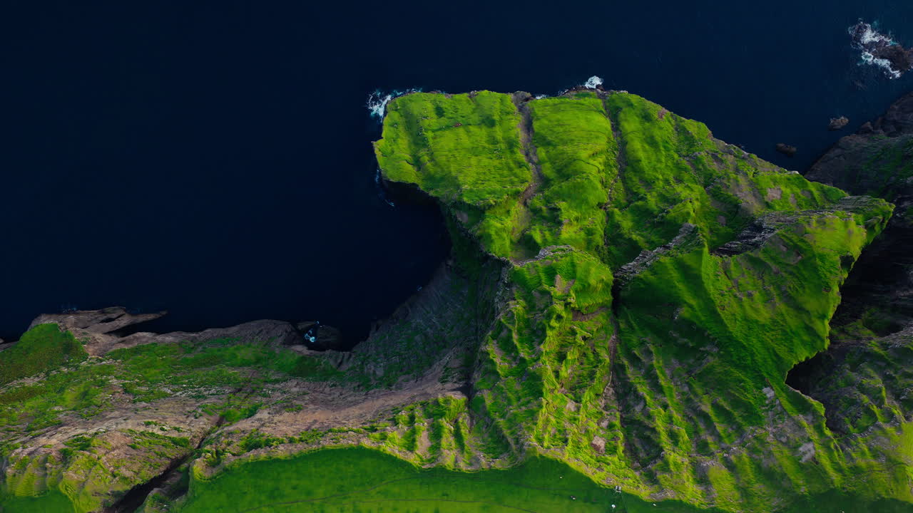 Dramatic Aerial View of Green Coastal Cliffs