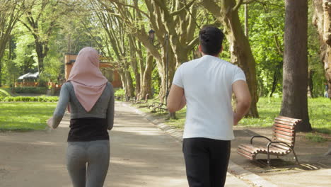 couple jogging in a park