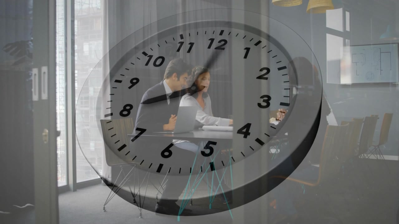 Man and woman reviewing data during business meeting, clock overlay fading in accelerating time