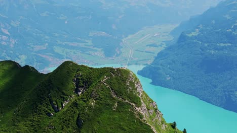 spectacular hardergrat peaks and turquoise lake nestled in swiss alpine scenery