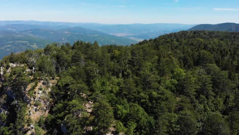 aerial tilt drone shot over banjska rock on the mountain tara in serbia
