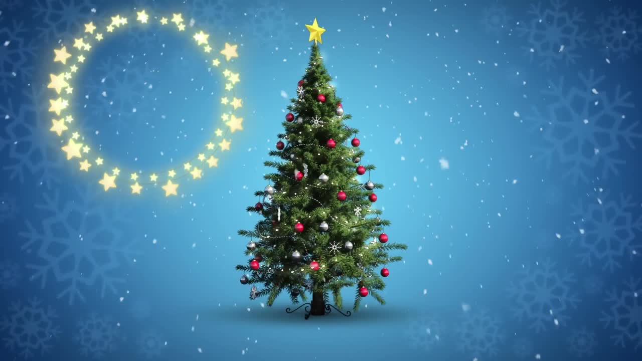 Decorative shining star lights against snowflakes falling over christmas tree on blue background