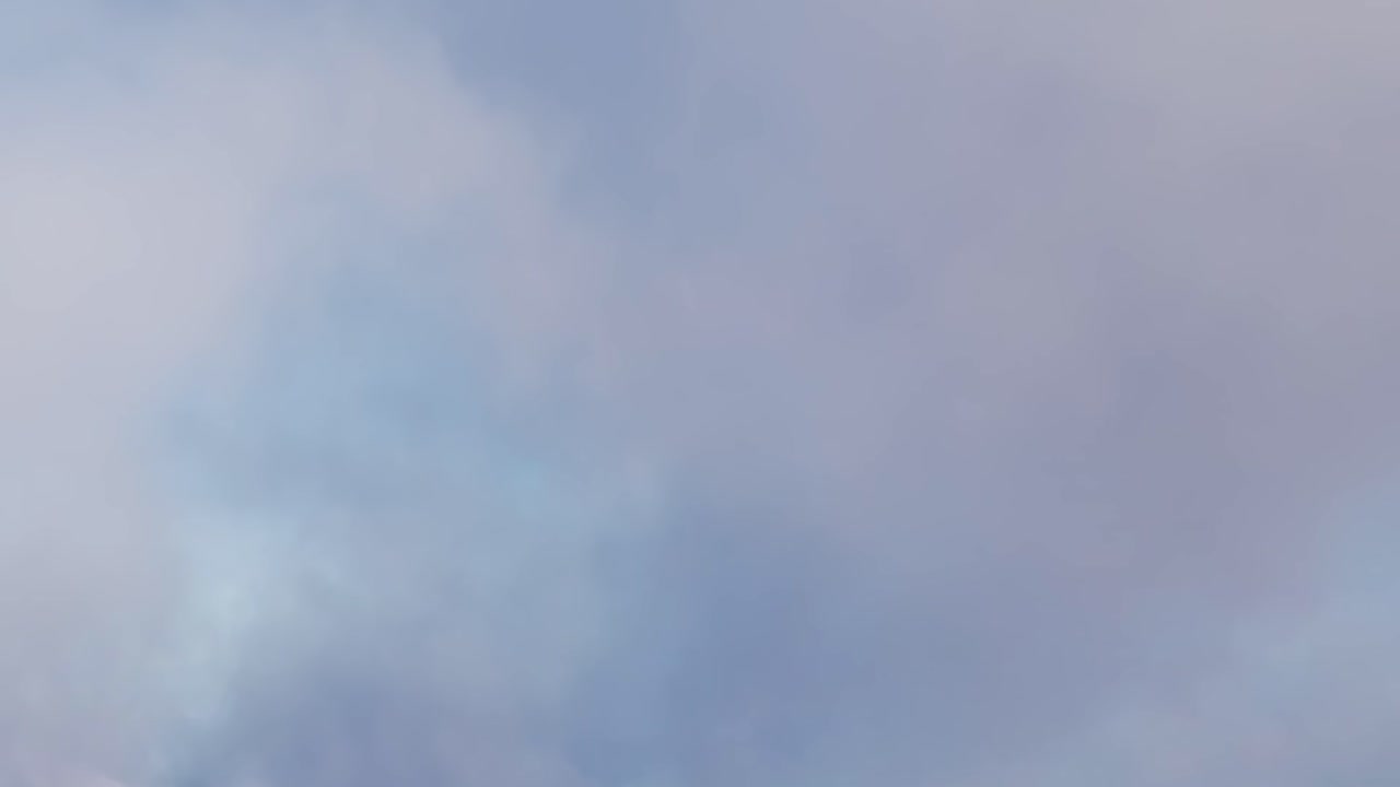 Clouds over Malaga, Spain create a unique sky view during the day