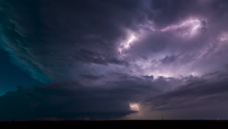 a massive supercell churns through the new mexico landscape after dark