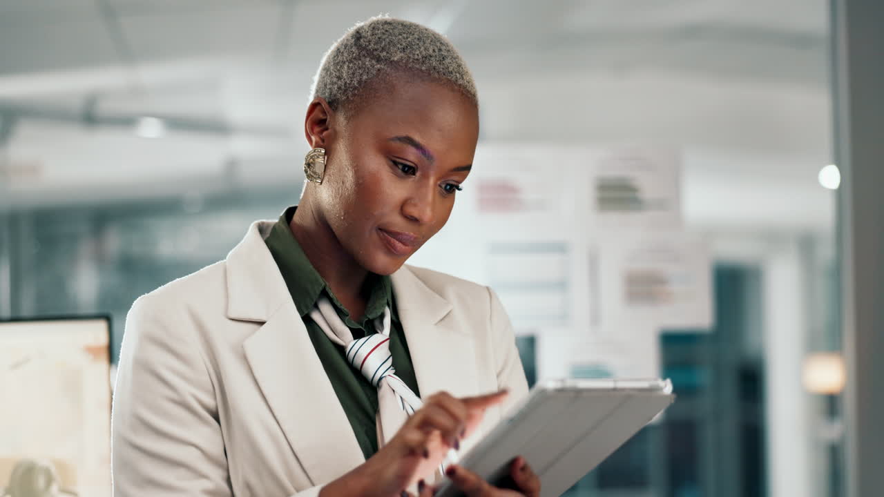 Businesswoman using a tablet in an office