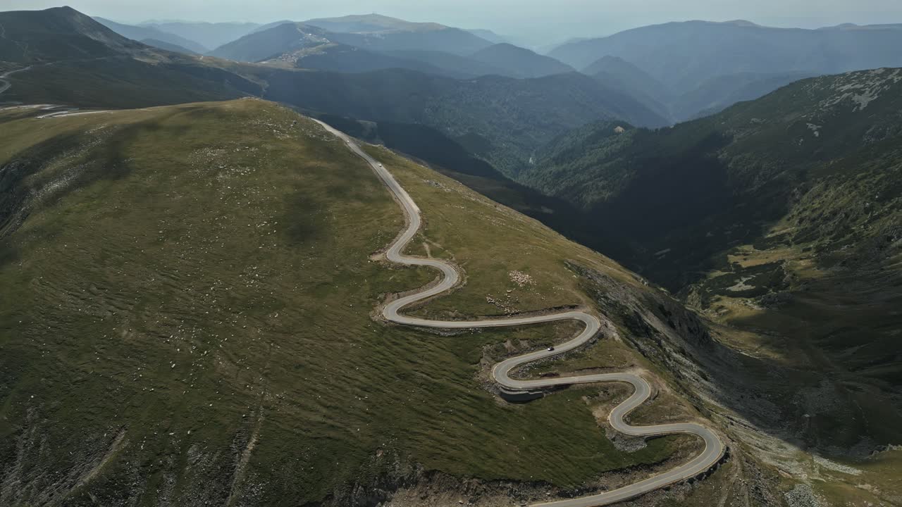 A peaceful nature scene featuring a winding forest path leading to a rustic wooden bridge over a calm lake. Surrounded by lush greenery and gentle water reflections, this setting evokes serenity