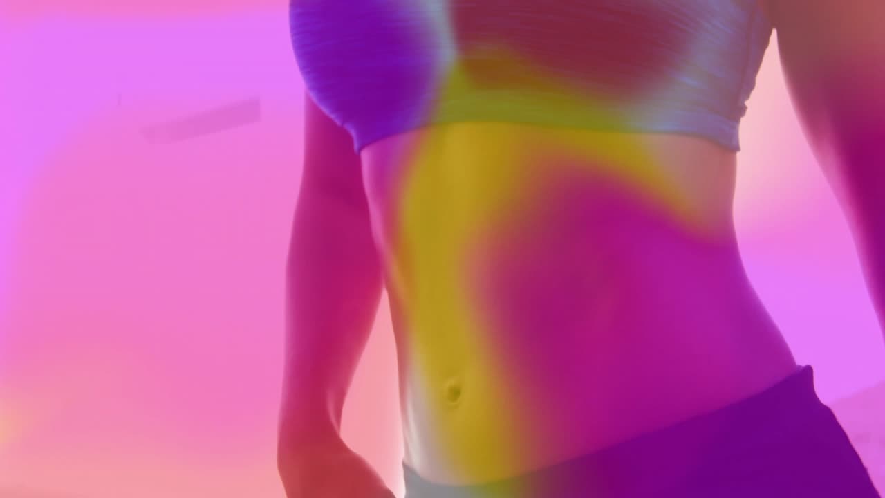 Woman breathing, adjusting posture in room, gradient bands tracing belly and sports bra for fitness