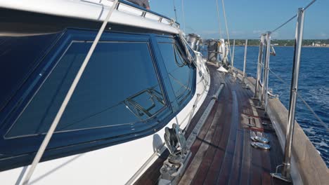 action cam view from the side of a yacht sailing towards new florida