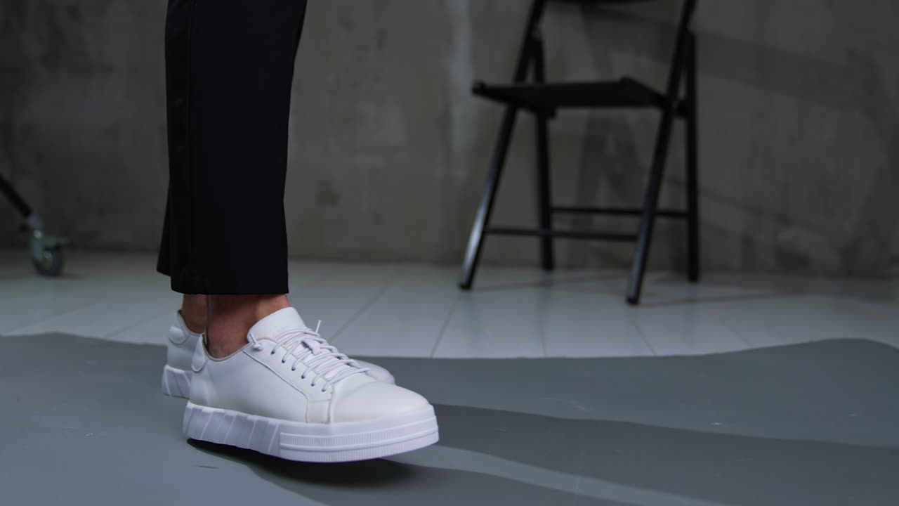 White Leather Sneakers on Legs