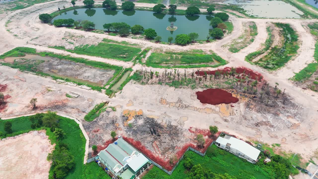 Aerial View Tilt of the Farm and Thuan An City.