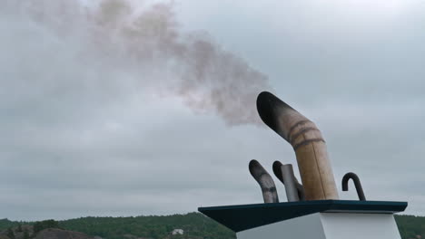 dark smoke coming from exhaust pipe on a boat - 4k 60fps