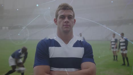 Animation-of-network-of-connections-over-portrait-of-caucasian-male-rugby-player-at-sports-field