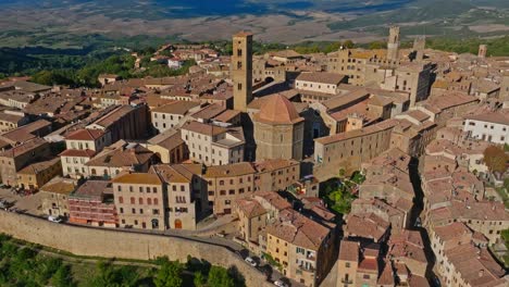 aerial around the walled town of volterra, province of pisa, italy