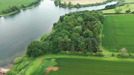 Aerial-moving-shot-of-Cransley-Reservoir-during-daytime-in-Northamptonshire-,-UK