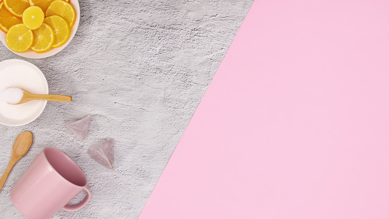 Sliced lemons, sugar, honey, pink cup for tea appear on left side. Stop motion