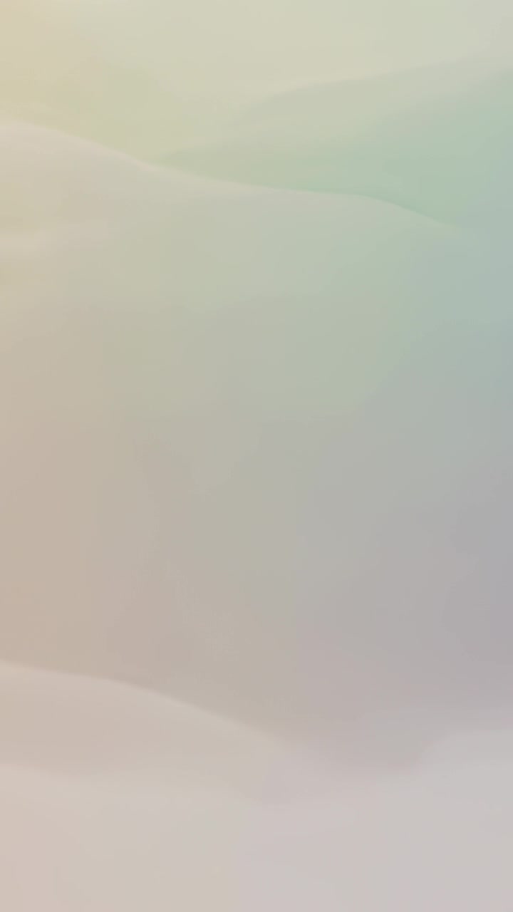 Vertical video: Playback starting, animated gradient sliding down device screen, revealing beige