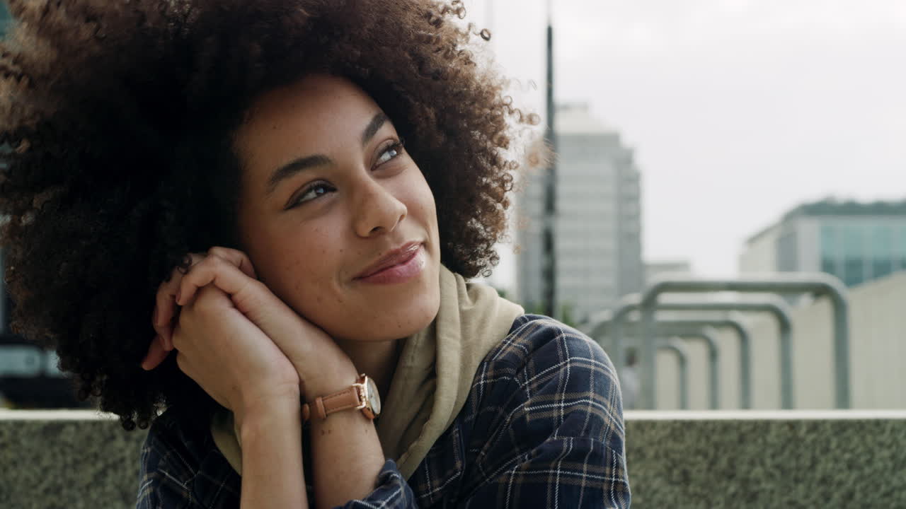 an attractive young woman sitting alone