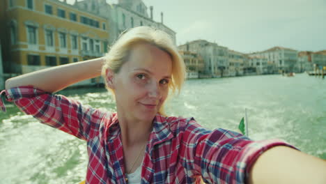 pov woman taking selfie in venice