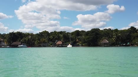 tropical village in bacalar shoreline in the riviera maya, quintana roo, mexico