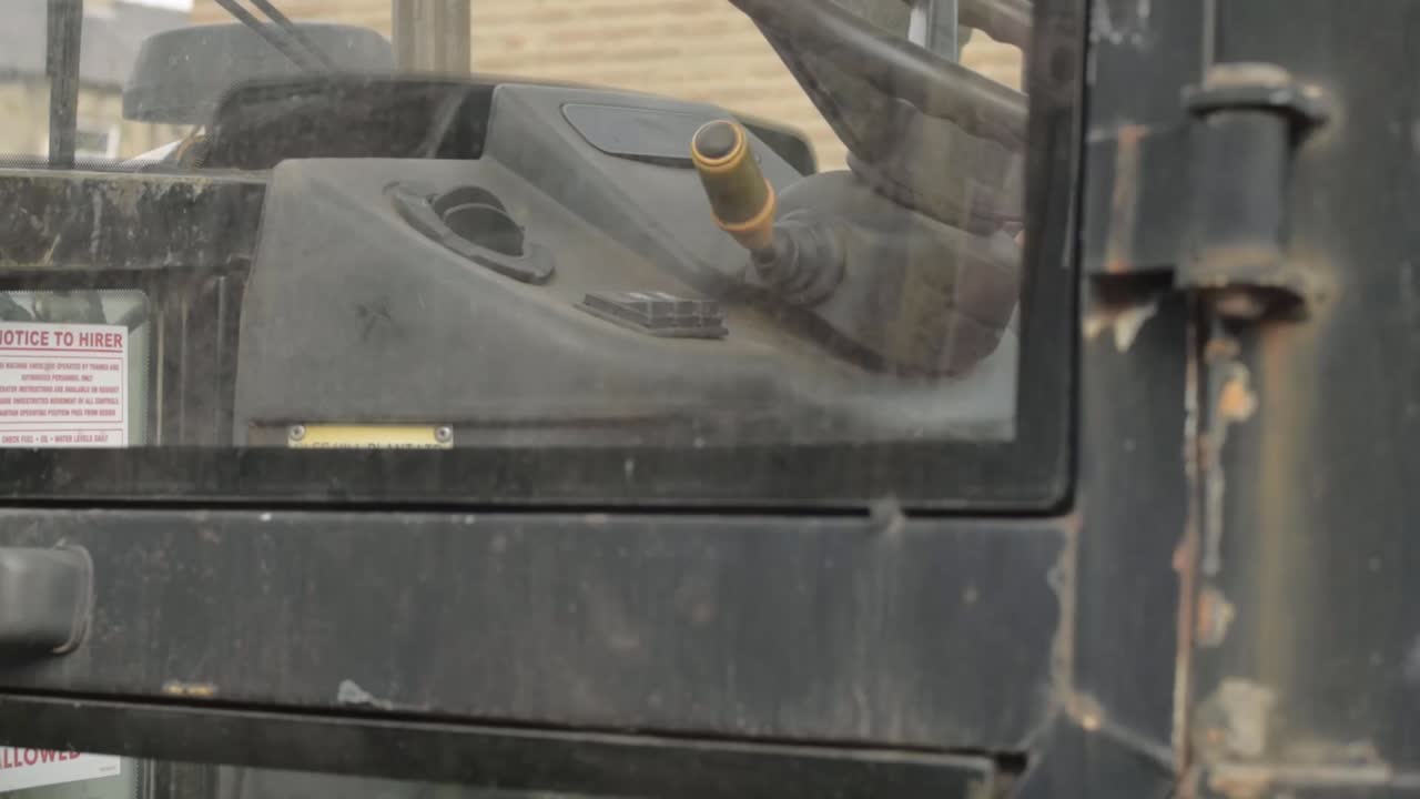 Industrial plant machinery driver cab tilting shot