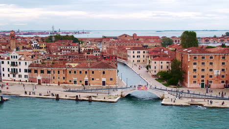 Aerial-shot-of-Castello,-Vence,-Italy-shoreline-at-sunset,-with-rio-dell'Arsenale