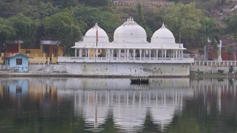 artistic city architecture with clam lake water reflection at morning video is taken at udaipur rajasthan india on nov 25 2023.