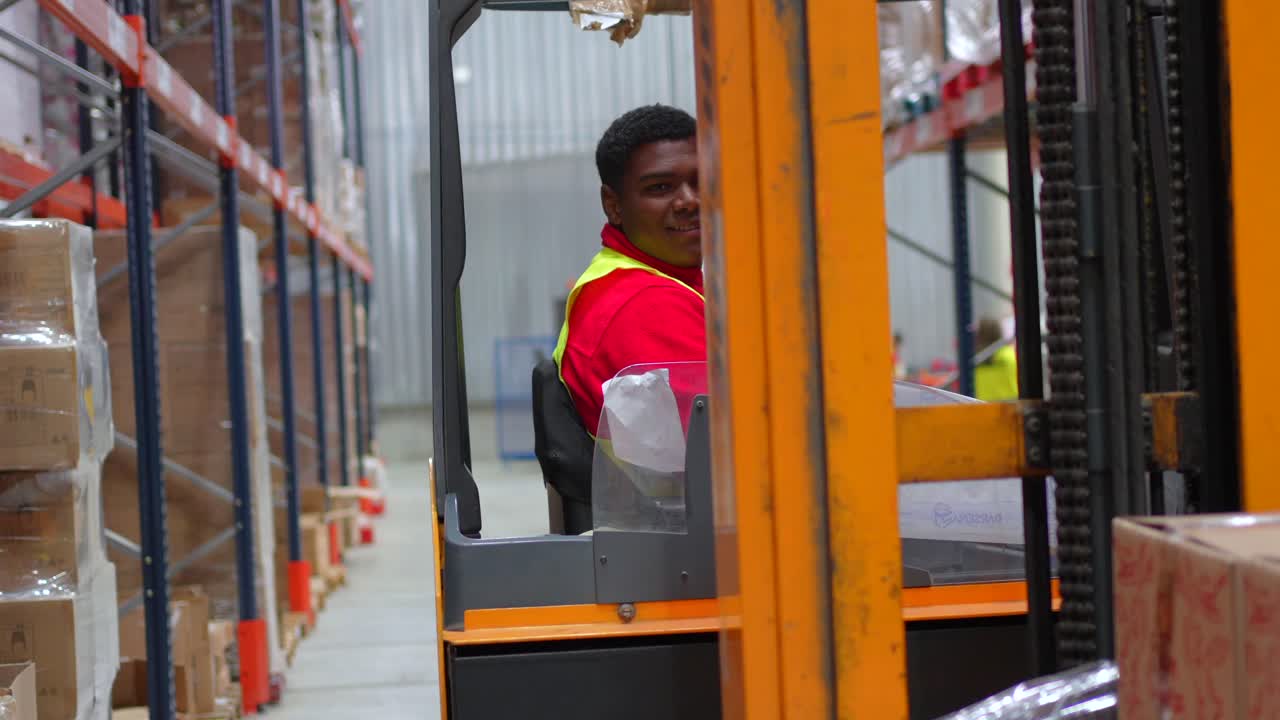 Forklift operator in a warehouse