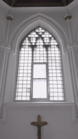 arch window in a church interior