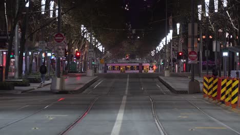 quiet city streets during melbourne's nightly covid curfew during australia's coronavirus outbreak