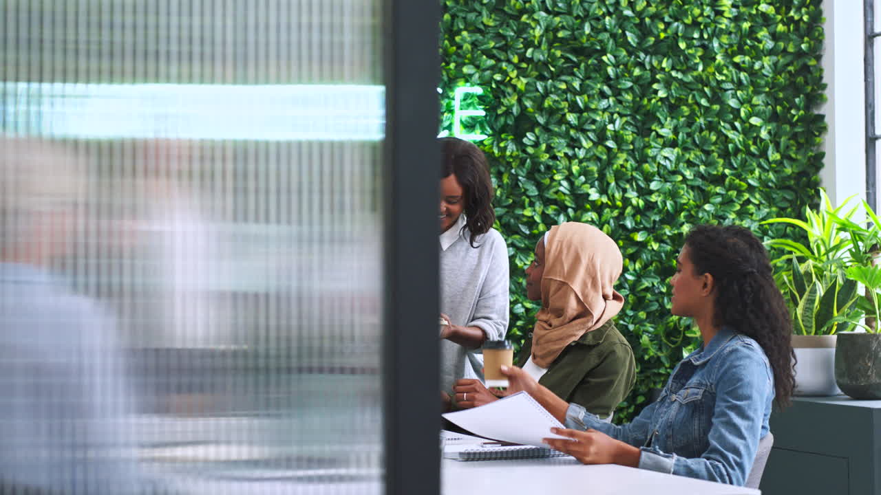 Business Meeting in Modern Workspace