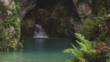 small secret cave waterfall in balneario mata de maiz in the dominican republic -wide