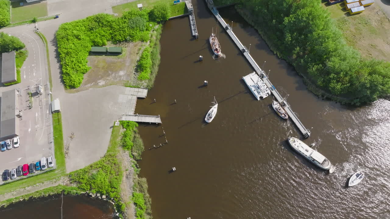 An aerial view of the harbour opens into the vast North Sea, emphasising the region's natural beauty and maritime significance as a prominent Dutch coastal area