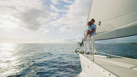 couple sailing into the sunset